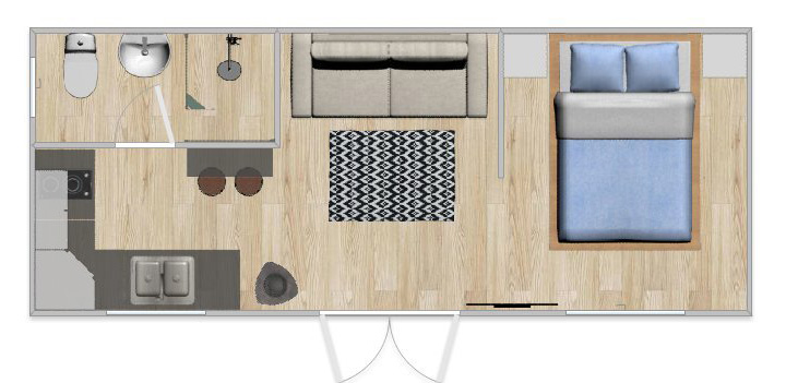 Floor plan of the Dorset shepherd hut showing bed, sofa, kitchen, and shower room